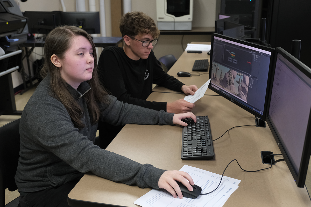 Students working together on a computer